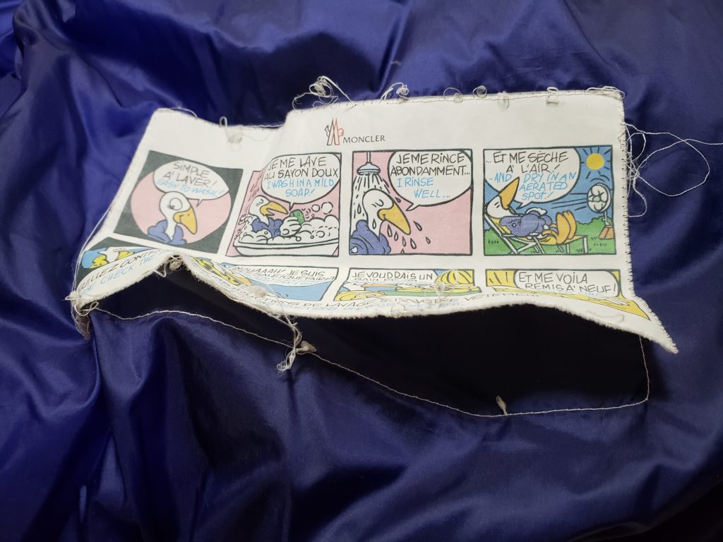 モンクレールダウンのアニメタグ修理